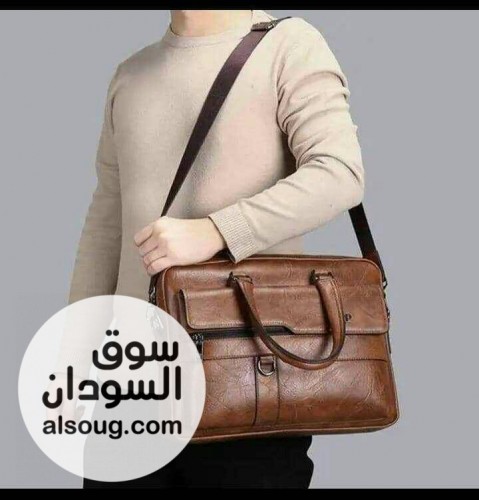 شنطة لابتوب بسوست وجيوب بمساحة كبيرة،شنطة كروسJeepخامة جلد - صورة رقم 1