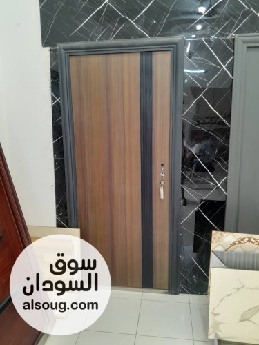 ابواب صينية للبيع السجانة وعطبرة تصميم راقي حديد شكل خشب - صورة رقم 3