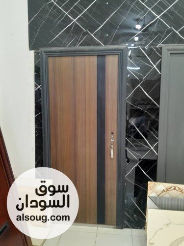 ابواب صينية للبيع السجانة وعطبرة تصميم راقي حديد شكل خشب - صورة رقم 1