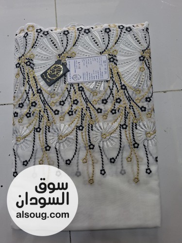 الأبيض السويسري المطرّز - صورة رقم 2