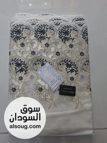 الأبيض السويسري المطرّز - صورة رقم 7