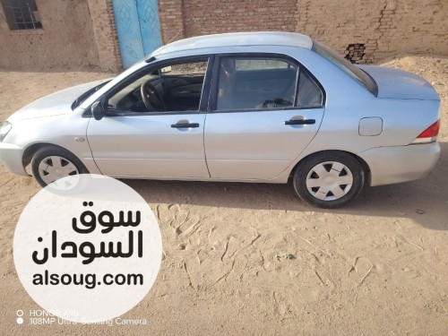 لانسر بومة 2004 شاذة - صورة رقم 15