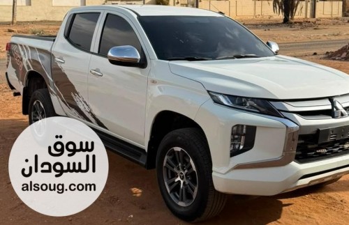 *الفلاح لتسويق السيارات*-*البيع في بحري*--بوكس ميتسويتشي-موديل 2024-مف - صورة رقم 2