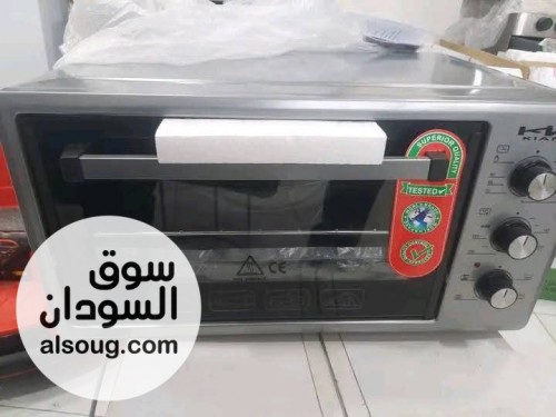 فرن كهربائي من نوع كومتل فضي اللون