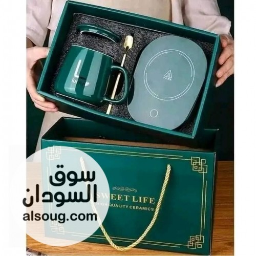 كوب مك مع قاعدة تسخين كهربائية